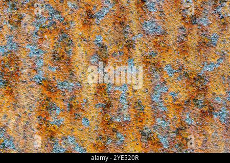Metal surface covered with corrosion spots of different shades, rusted corroded metal surface background, texture, different colors rust texture Stock Photo