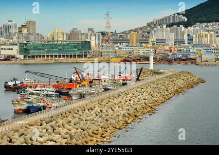 The Port of Busan is the largest port in South Korea, located in the city of Busan, South Korea. Its location is known as Busan Harbor. Stock Photo