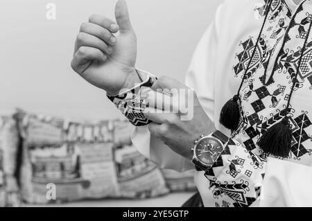 Traditional Ukrainian Attire with Intricate Embroidery and Elegant Accessories. Stock Photo