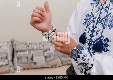 Traditional Ukrainian Attire with Modern Accessories. Stock Photo