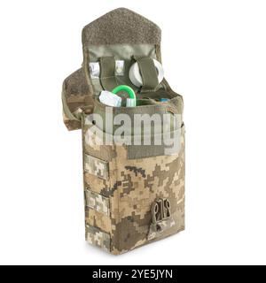 First aid kit for the battlefield, in pixel camouflage. Military tactical equipment for paramedics. A battlefield first aid kit. Stock Photo