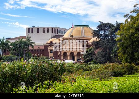 Dome of the Natural History Museum of Los Angeles County building in Los Angeles, California, seen from the rose gardens in Exposition Park Stock Photo