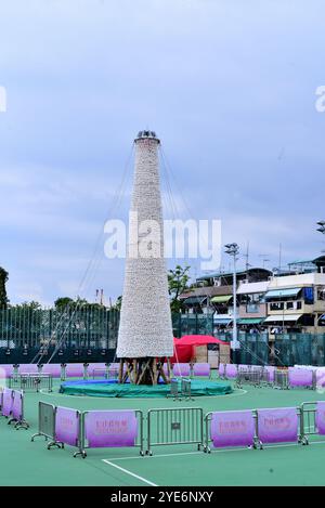 Bun tower built on a playground for grabbing competition in Tai Ping Ching Jiu (aka Bun Festival) in Cheung Chau, Hong Kong Stock Photo