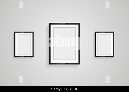 Three picture frames with black blank hanging on the whitewall for mock up design, vector black photo frames in diferent sizes of wooden Frames Hangin Stock Vector