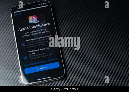 New York, USA - October 29, 2024: Set up Apple Intelligence on smartphone screen on black table background Stock Photo