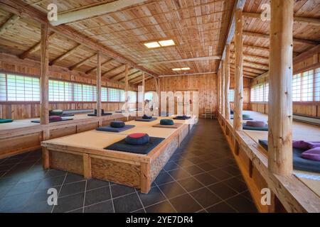 Interior view of the main prayer area, all natural wood. At the Morgan Bay Zendo Japanese Buddhist retreat in Surry, Hancock County, Down East, Maine. Stock Photo