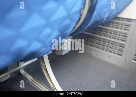 Early morning on October 13, 2024, power outlet on Jin Air flight parked at Incheon International Airport in Gonghang-ro, Jung-gu, Incheon, South Kore Stock Photo