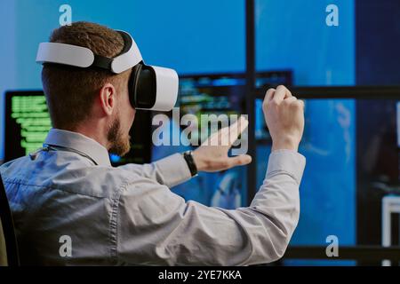 Man Using Virtual App At Work Stock Photo