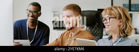 Group of Developers Working In Office Website Header Stock Photo