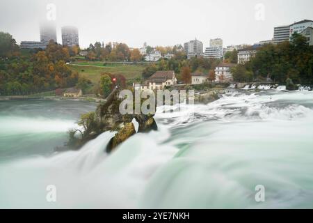 The beautiful Swiss Rhine Falls seen during the fall time. Stock Photo