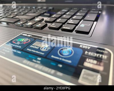 ASUS laptop keyboard and panel specifications close up detail Stock Photo