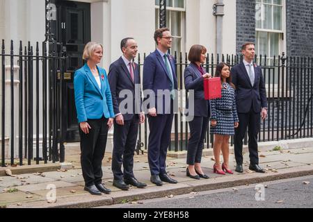 London, UK. 30 October  2024  Chancellor of the exchequer, Rachel Reeves   holds the red box outside 11 Downing street with  her treasury team left to right,  UK parliamentary secretary, Emma Reynolds  UK  secretary to the treasury, James Murray,  UK chief secretary to the treasury, Darren Jones  UK economic secretary to the treasury Tulip Siddiq, and  UK financial secretary to the treasury Spencer Livermore, ahead of presenting her budget to parliament in  Rachel Reeves, the first female Chancellor of the Exchequer. Credit.Amer Ghazzal/Alamy Live News Stock Photo