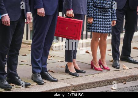 London, UK. 30 October  2024  Chancellor of the exchequer, Rachel Reeves   holds the red box outside 11 Downing street with  her treasury team left to right,  UK parliamentary secretary, Emma Reynolds  UK  secretary to the treasury, James Murray,  UK chief secretary to the treasury, Darren Jones  UK economic secretary to the treasury Tulip Siddiq, and  UK financial secretary to the treasury Spencer Livermore, ahead of presenting her budget to parliament in  Rachel Reeves, the first female Chancellor of the Exchequer. Credit.Amer Ghazzal/Alamy Live News Stock Photo