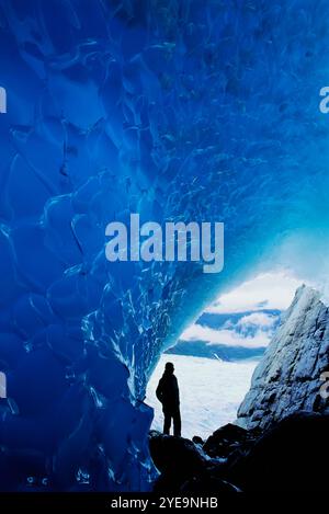 Tourist at Mendenhall Glacier in Juneau, Alaska, USA; Juneau, Alaska, United States of America Stock Photo