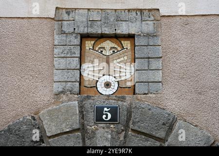 Modern or Contemporary Stone Mosaic Showing Person Reading a Book at Entrance to Bookshop Digne or Digne-les-Bans Provence France Stock Photo
