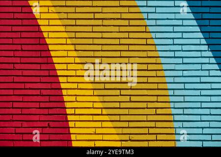 Multi colored abstract textured background. Colored brick wall backdrop Stock Photo