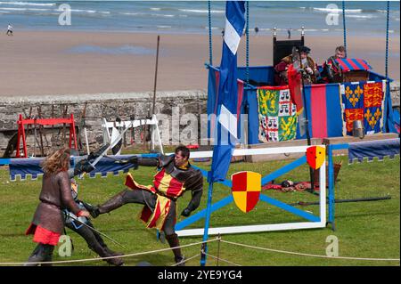 4 Knights in Chainmail Swordfighting in Reenactment at Banburgh Castle ...