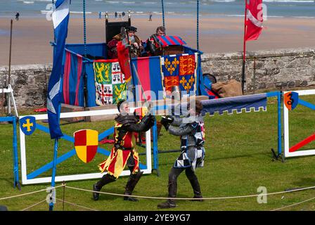 3 Knights in Chainmail Swordfighting in Reenactment at Banburgh Castle ...
