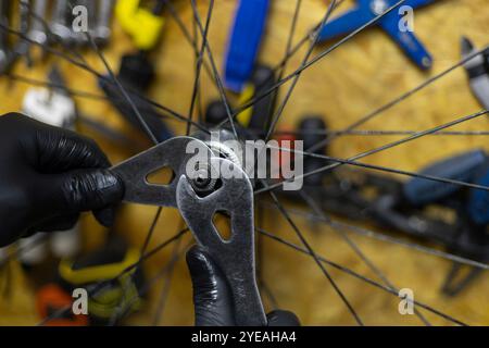 Close-up of Maintenance of the front wheel of a bicycle rim 29 Stock Photo