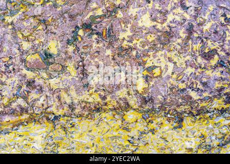 Yellow-brown granite. Granite stone texture. Abstract stone background. Stock Photo