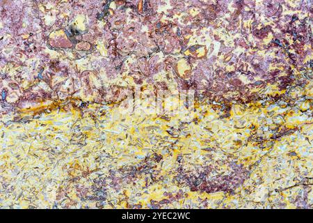 Yellow-brown granite. Granite stone texture. Abstract stone background. Stock Photo