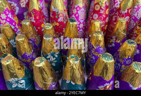 Various firecrackers displayed for sell at a market on the eve of Diwali, the Hindu festival of lights, in Guwahati, India on October 30, 2024. Diwali, also known as the Festival of Lights, is one of the most widely celebrated Hindu festivals, symbolizing the victory of light over darkness and good over evil. Credit: David Talukdar/Alamy Live News Stock Photo