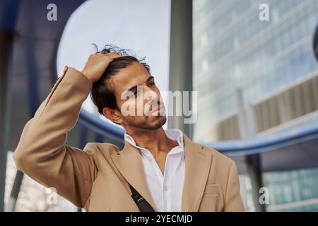 portrait of a stylish young Indian dressed in a suit Stock Photo