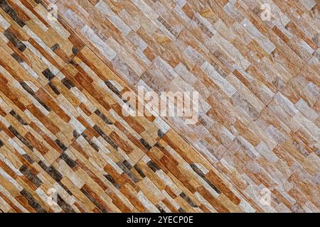 abstract patterns of coloured bricks or tiles laid diagonally in contrasting arrangement forming interesting pattern suitable for use as a background Stock Photo