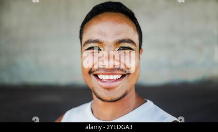 Lgbt pride, Gay man wearing makeup smiling on camera. Equality, diversity and non-binary expression Stock Photo