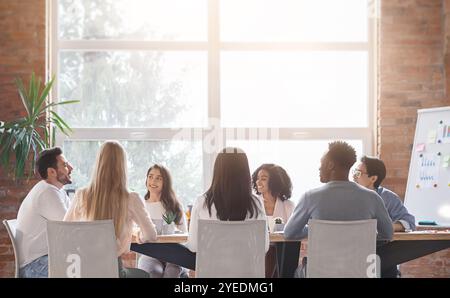 Young multiracial business team having morning briefing Stock Photo