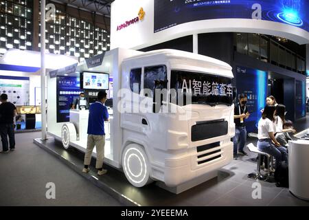 SHANGHAI, CHINA - JULY 10, 2021 - Visitors visit the AI iLab scene displayed at the Astrazeneca stand at the 2021 WAIC in Shanghai, China, July 10, 20 Stock Photo