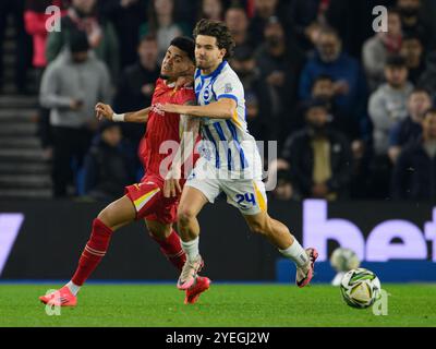 Brighton, UK. 21st Sep, 2024. Brighton, England - October 30: Brighton & Hove Albion's Ferdi Kadıoglu (right) battles with Liverpool's Luis Diaz (left) during the Carabao Cup 2024/25 match between Brighton & Hove Albion FC v Liverpool FC at Amex Stadium on October 30, 2024 in Brighton, England. (David Horton/SPP) Credit: SPP Sport Press Photo. /Alamy Live News Stock Photo