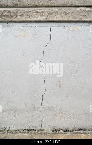 Close-up view of the cement crack wall texture background. Stock Photo