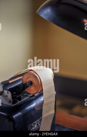 Vintage Mechanical Adding Machine with Paper Roll Stock Photo