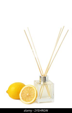 Reed diffuser and lemons isolated on white background. Top view Stock Photo