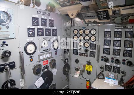 This photograph captures the control panel area inside a submarine. Stock Photo