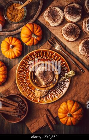 Homemade pumpkin muffins with cheesecake icing Stock Photo