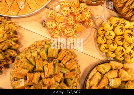 Display of plates full of various freshly baked armenian style delight candy deserts in famous Tsovagyugh food court in Armenia Stock Photo