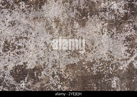 Rough, uneven faned surface of concrete with scratches. Abstract background. Stock Photo