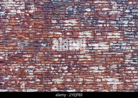 Uneven brick wall red and white creative background. Stock Photo