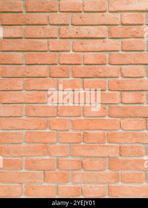 Uniform Orange Brick Wall Pattern Stock Photo
