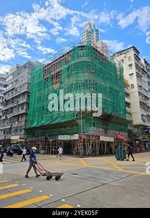 Renovation of an old residential building on the corner of Bute street and Shanghai street in Mong Kok, Kowloon, Hong Kong. Stock Photo