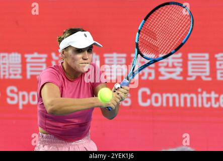 Hong Kong, China. 31st Oct, 2024. Sofia Kenin hits a return during the women's singles round of 16 match between Sofia Kenin of the United States and Jessika Ponchet of France at WTA250 Hong Kong Tennis Open in Hong Kong, south China, Oct. 31, 2024. Credit: Lo Ping Fai/Xinhua/Alamy Live News Stock Photo