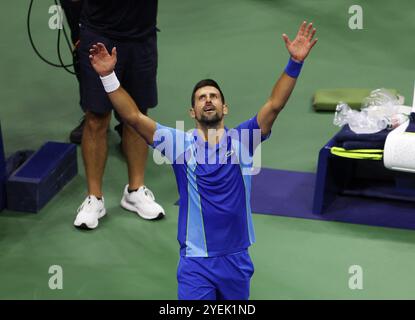 Tennis - U.S. Open - Flushing Meadows, New York, United States - September 10, 2023 Serbia's Novak Djokovic celebrates winning his final match. Stock Photo