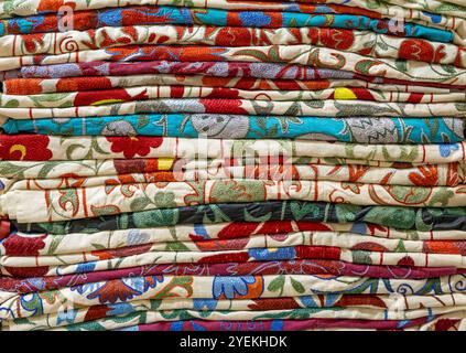 Background of colorful woven fabric, natural stacked cloth pattern Stock Photo