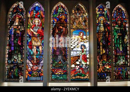 gallery stained glass windows by a w lyons in the church of st mary of the rosary church in cong, county mayo, republic of ireland Stock Photo