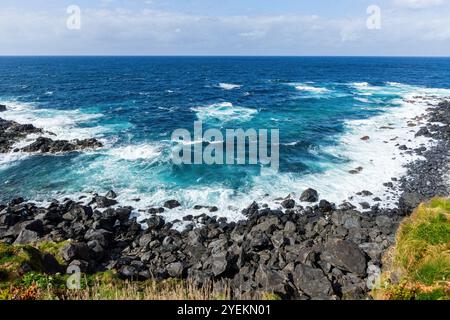 Big waves crashing on rocks in the atlantic ocean in Azores islands Portugal Stock Photo