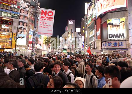 Huge crowds in Shibuya, Tokyo in Japan to celebrate Halloween. It has become tradition for many locals and tourists to descend on the famous Shibuya Scramble Crossing to celebrate Halloween. However, in recent years there have been so many people that the area has descended into chaos. This year the police have put in controls to stop drinking and parties from 6pm until 4am and made the crossing into a one-way system, to try and maintain order amongst the crowds. Despite requests to stay away, the area was as busy as ever with people enjoying the world famous Shibuya atmosphere. Stock Photo