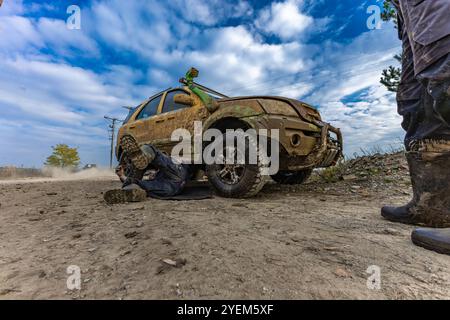 Off-road vehicles, driving in mud, overcoming off-road obstacles in a four-wheel drive car Stock Photo