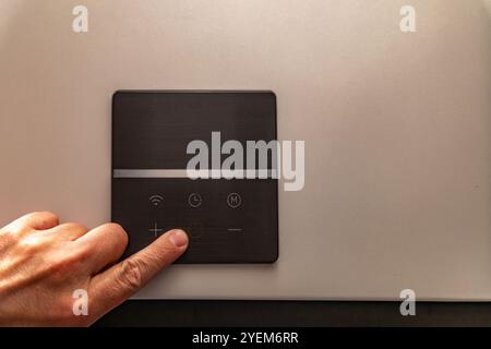 Electronic panel for setting the temperature in the water heater furnace Stock Photo